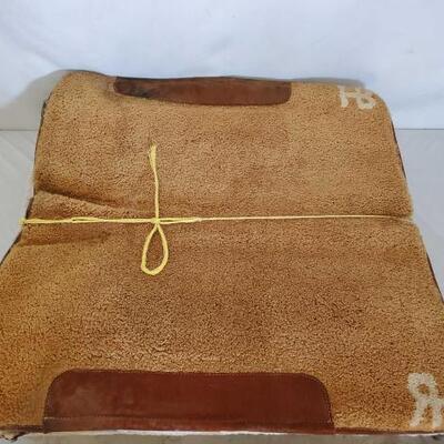Used Saddle Pads
Various saddle pads Sized between 29"-32"
 4 with leather wears. 