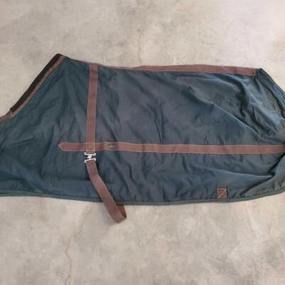 530	

4-Brand Name Horse Sheets and Blankets
1- Galveston Equine Enterprises Sheet, size 78. Needs repair, tear near rear of blanket and...