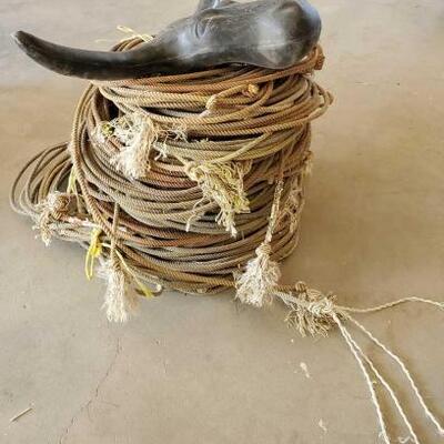 385	

1 Steer Head Roping Dummy, New Leather Horn Wraps, 3 Misc Bundles of Used Rope
1- Steer Head Roping Dummy
3- Large Bundles of used...