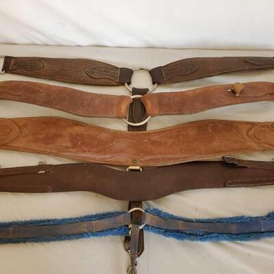 402	

Five Cowboy Breast Collars
Five Cowboy Breast Collars.  Roping collar is a Billy Cook made.  Some need repair and some are missing...