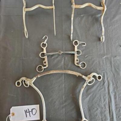 40	

Two Cowboy Curb Bits, Snaffle Bit and a Kelly Hackamore Bit
Two Cowboy Curb Bits, and snaffle and a Kelly Hackamore Bit