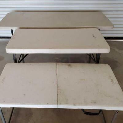 471	

Portable Plastic Folding Tables
3 Portable Plastic Tables
1 Samsonite Brand measures 6 ft long, 29 1/2