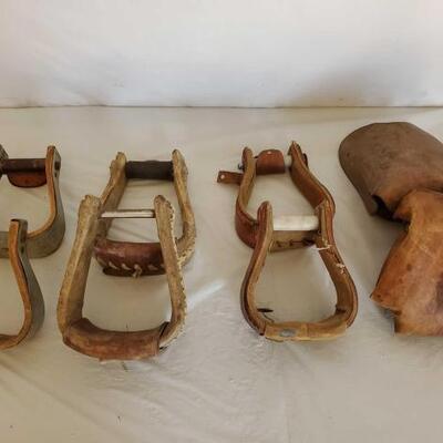 415	

Three Sets of Cowboy Stirrups and a set of Kids Tapaderos
Three Sets of Cowboy Stirrups and a set of Kids Tapaderos