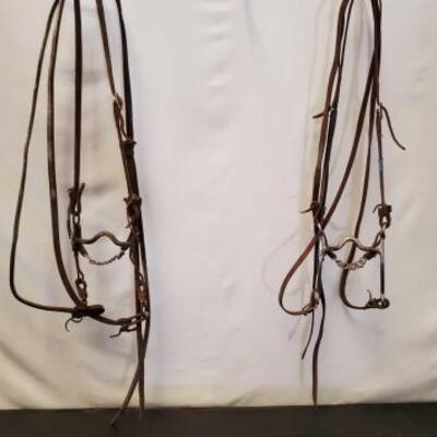 152	

Two Complete Cowboy Bridles
Two Used Complete Cowboy Bridles