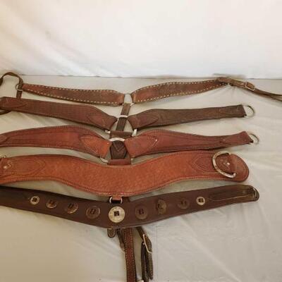 401	

Five Harness and Vintage Cowboy Breast Collars
Five Harness, Vintage and roping Cowboy Breast Collars.  Some parts are missing....