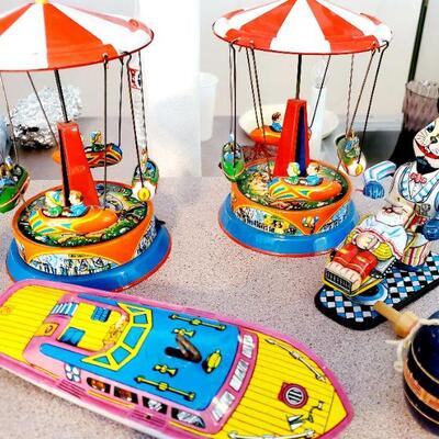 Vintage wind up tin toys