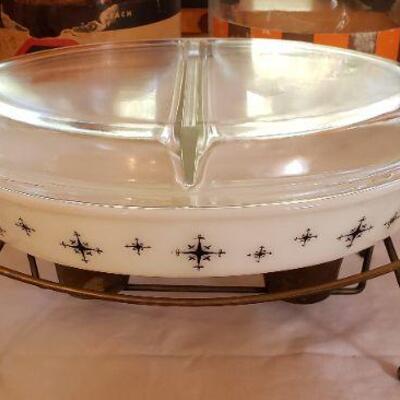 Rare Pyrex 1959 Christmas promotional pattern covered, divided casserole dish with stand.