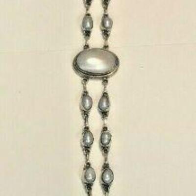 https://www.ebay.com/itm/124408706019	WL171 STERLING SILVER AND PEARL INLAY NECKLACE NEEDS CLASP 		 Auction 
