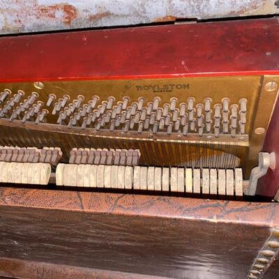 Leather-covered speakeasy piano.  Only 44 inches wide, 40 inches high, 22 inches deep from front to back.  The keyboard is 36 inches...