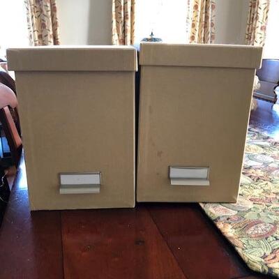 A pair of linen-covered file boxes $18