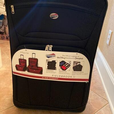 Unused American Tourister luggage set of 4