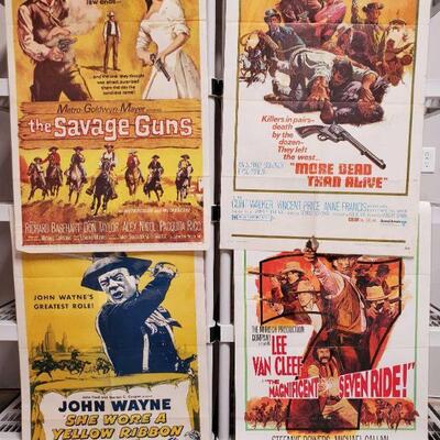 1148	

4 Vintage Western Movie Posters
Includes She Wore A Yellow Ribbon, The Magnificent Seven Ride, More Dead Than Alive, And The...