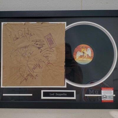 1004	

Framed Led Zeppelin "In Through the Out Door" Matted Record Album with COA
Includes COA by Pinpoint Signature...