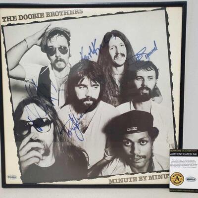 1012	

Framed The Doobie Brothers Signed Vinyl Record Album with COA
Includes Authenticated Ink COA Cert No: M600911 Measures approx 13
