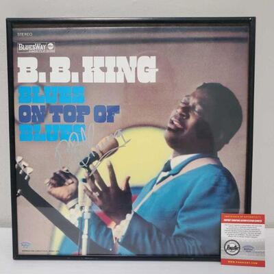 1016	

Framed BB King Signed Blues on Top of Blues Album with COA
Includes COA by Pinpoint Signature Authentication Services. Cert No...