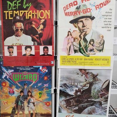 1208	

4 Vintage Movie Posters
Includes The Wizard, Silence Of The North, Dead Heat On A Merry Go Round And Def By Temptation