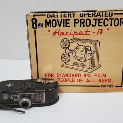 1428	

Battery Operated 8mm Movie Projector, Keystone 8mm Camera Model K-8
Battery Operated 8mm Movie Projector, Keystone 8mm Camera Mode