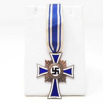 
#182 â€¢ WWII German Nazi Bronze mother's cross with swastika, blue & White ribbon