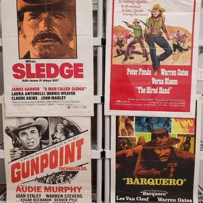1160	

4 Vintage Western Movie Posters
Includes The Legend Of The Lone Ranger, Barquero, A Man Called Sledge, And Villa Rides
