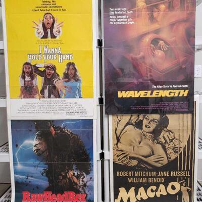 1188	

4 Vintage Movie Posters
Includes Macao, Raw Head Rex, Wavelength, And I Wanna Hold Your Hand