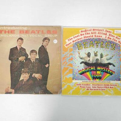 1028	

2 Beatles Vinyl Record Albums- Introducing The Beatles and The Magical Mystery Tour
2 Beatles Vinyl Record Albums- Introducing The...