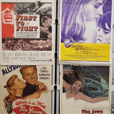 1184	

4 Vintage Movie Posters
Includes The Jaws Of Death, When is a Miss Too Young To Kiss, Secret World, And First To Fight
