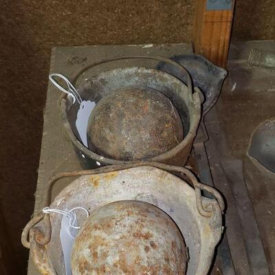 Smelting pots, antique balls