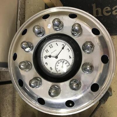 Silver Truck wheel clock $50