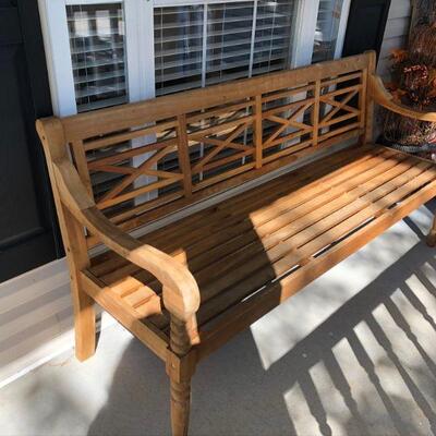 Wooden outdoor bench that measures 68 1/2