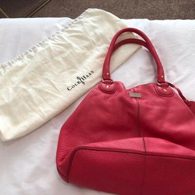 Cole Haan fuchsia purse with soft cloth cover.  In good shape. 