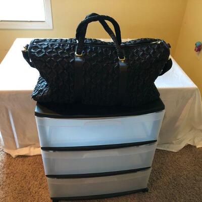 Sterilite three drawer storage system and black duffel bag, nearly new. 