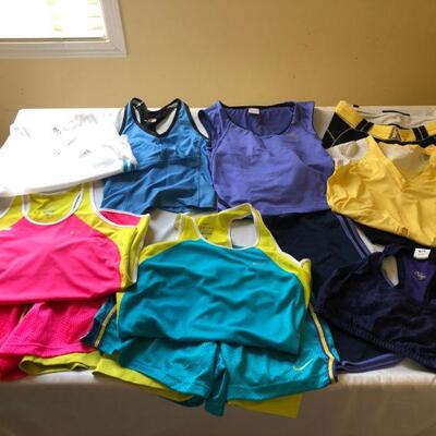 Women's workout clothes from Adidas, Nike dri fit, Bebe Sport and more.  Sizes range from S - L.