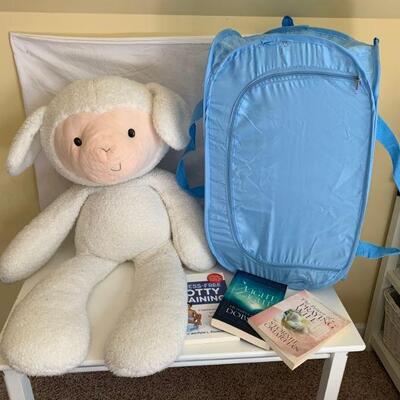 Women's books, portable easy storage hamper and an oversized Gund baby lamb.