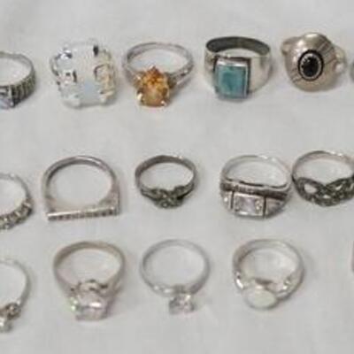 1012	LOT OF 32 STERLING SILVER RINGS COMBINED WEIGHT INCLUDING STONES ETC. IS 4.95 TROY OUNCES 
