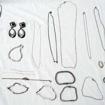 1011	LOT OF STERLING SILVER JEWELRY INCLUDING FIVE CHAINS, SEVEN BRACELETS, A NECKLACE W/ A PENDANT, TWO PAIRS OF EARRINGS & A RING W/...