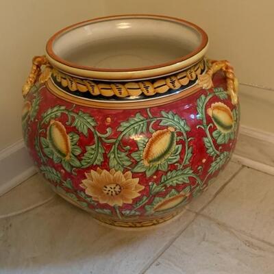 #28--large ceramic planter with yellow flowers (cracked on one side), $15