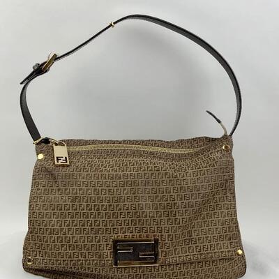 This Fendi FF Print bag is available for purchase on https://scavengersparadiseestatesales.com    