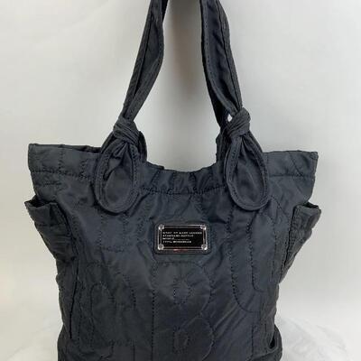This Quilted Black Marc by Marc Jacobs bag is available for purchase on https://scavengersparadiseestatesales.com    