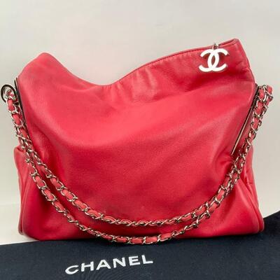 This Chanel Pink bag is available for purchase at https://scavengersparadiseestatesales.com    