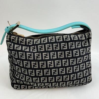 This Fendi Zucca Pattern canvas & leather bag is available for purchase on https://scavengersparadiseestatesales.com    