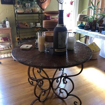 metal round dining table - no chairs - but we have green metal chairs sold separate