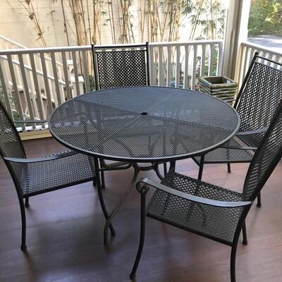 Wrought iron patio table and 4 chairs $195
table 48