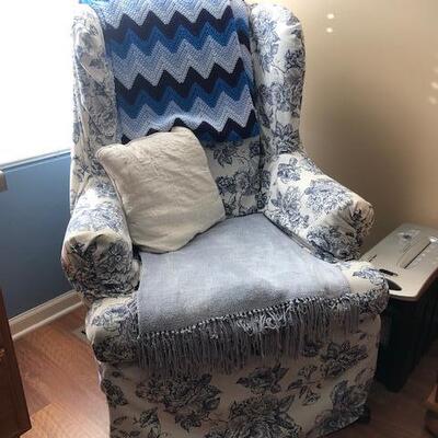 Blue covered chair 
Blue Afghan