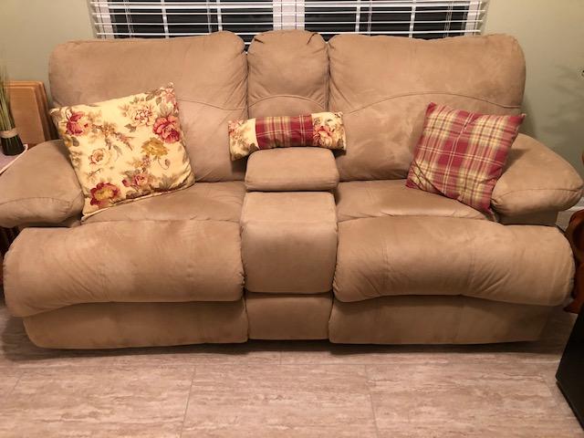 Beige Love Seat with 2 Recliners and center storage holder