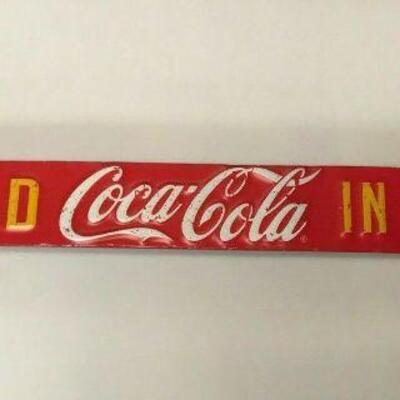 https://www.ebay.com/itm/124444333727	WL206 COCA-COLA METAL SIGN LONG, THIN RED WITH WHITE AND YELLOW LETTERING 		 Auction 
