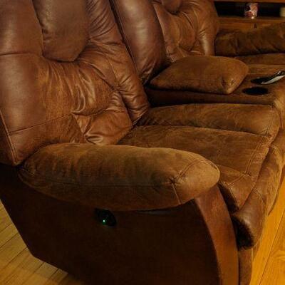 Rocker/Recliner with electric buttons to operate on each side! Center console.