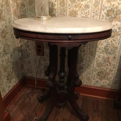 Antique oval table with marble top $125
24 1/2 X 18 1/2 X 29