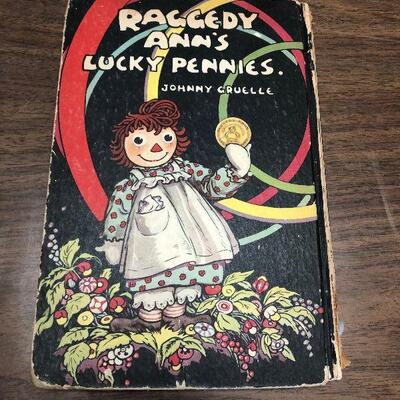 https://www.ebay.com/itm/114398471184	LX2062 Raggedy Ann's Lucky Pennies by Johnny Gruelle 1932 Book ASIS		 OBO 	 $19.99 
