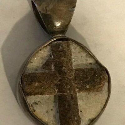 https://www.ebay.com/itm/114387005271	WL101 STERLING SILVER STAUROLITE STONE PENDANT BY STARBORN		 Buy-it-Now 	 $100.00 
