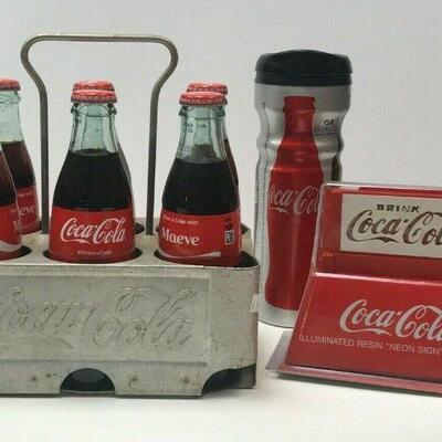 https://www.ebay.com/itm/124367472431	WL164 COCA COLA LOT OF 3 ITEMS 6 PACK W VINTAGE STYLE HOLDER, THERMOS AND SIGN 		 Buy-it-Now...